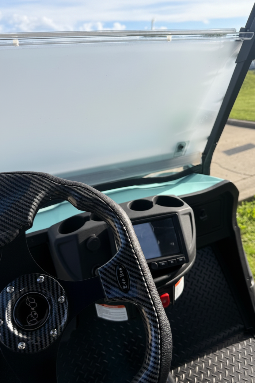 EVA BEA KB-G2+2H interior dashboard with carbon fiber steering wheel and multimedia display